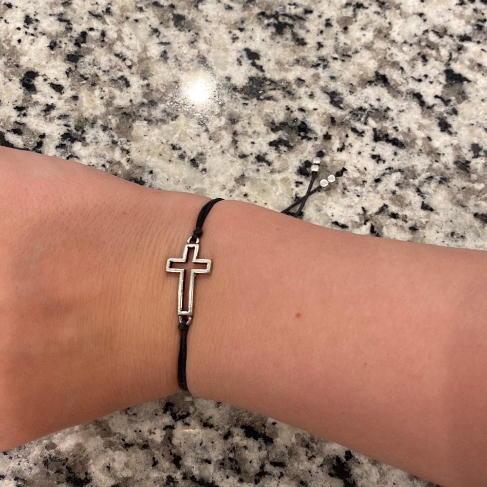 Adjustable cross braclet